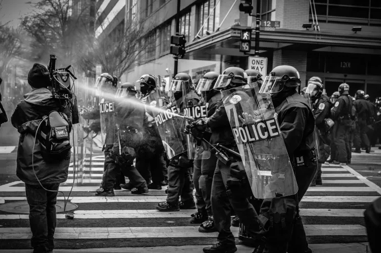 police controlling a riot