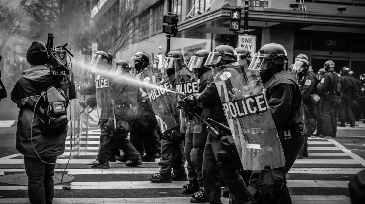 police controlling a riot